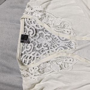 Cream colored 3/4 length sleeve sweater with lace